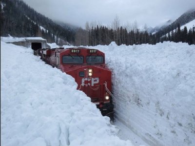 train going through deep snow.jpg